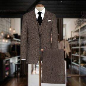 Dark brown herringbone tweed fabric sample