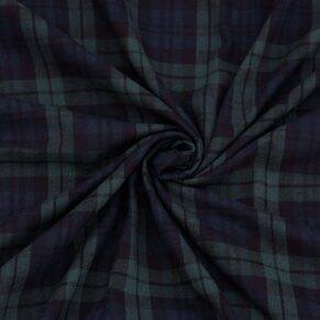 Green and navy tartan fabric with intersecting checks