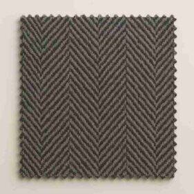 Herringbone suit fabric showing its repeated V-shaped weave